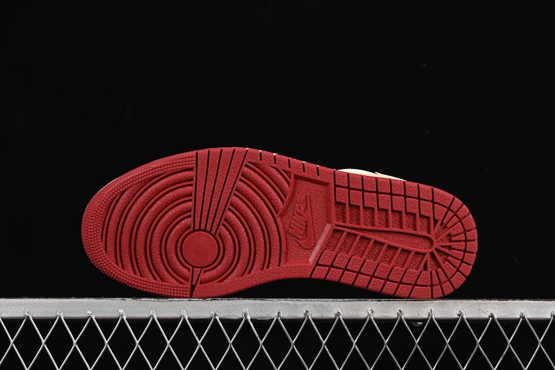 Underside view of the red rubber outsole
