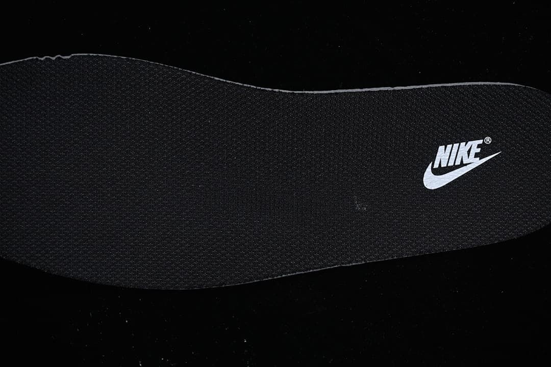 Black shoe insole with a Nike logo