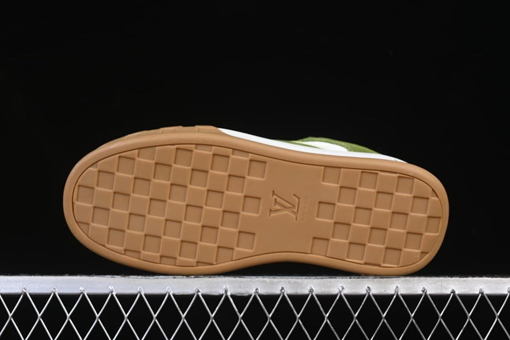 Underside showing square-pattern tread on the tan outsole