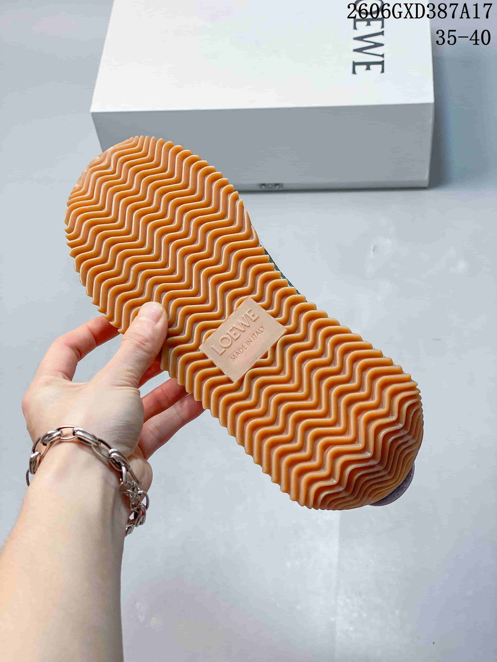 Close-up of the gum-colored outsole with a wavy tread pattern