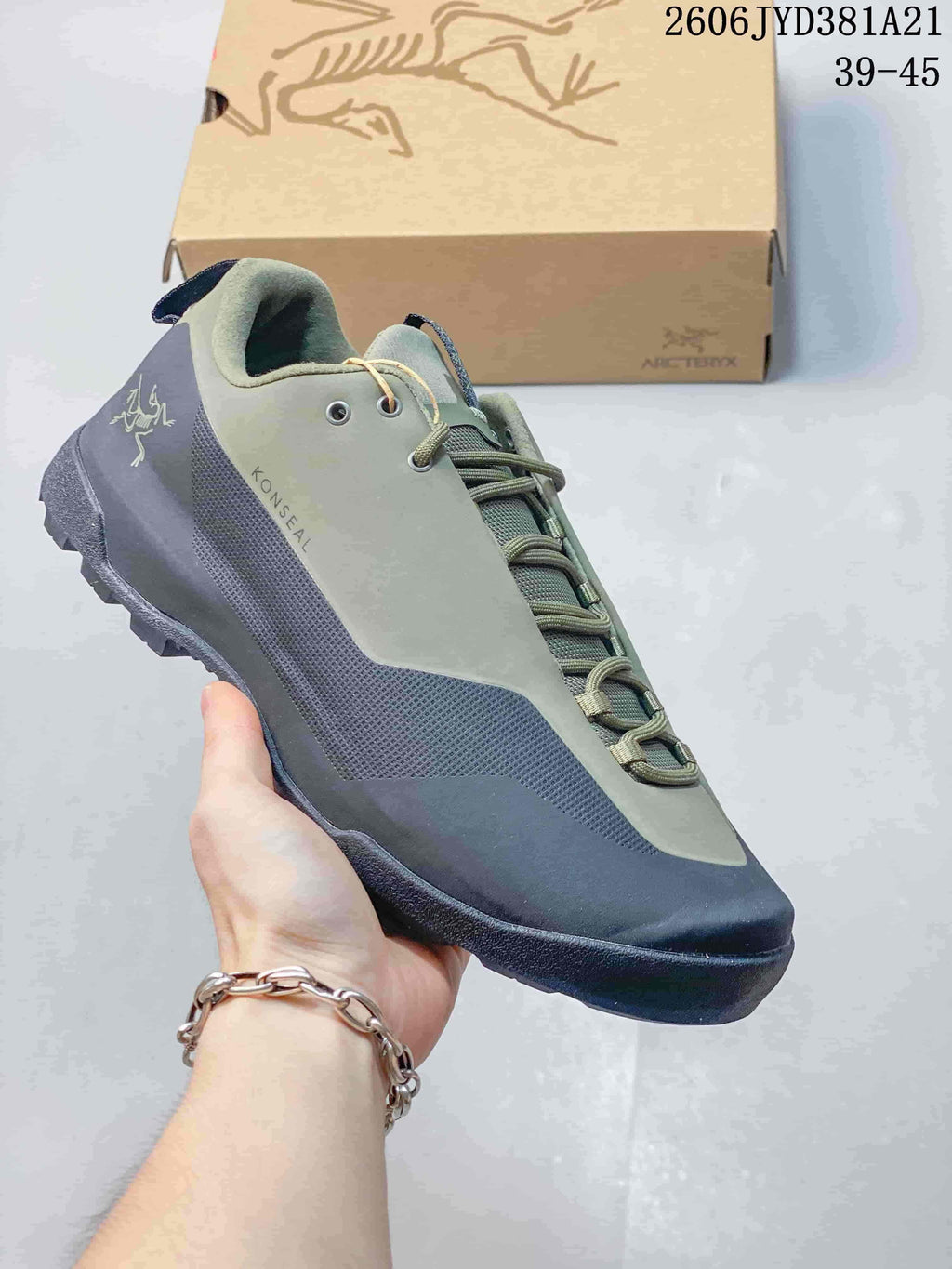 Olive and dark gray Arc'teryx Konseal shoe with a lugged outsole