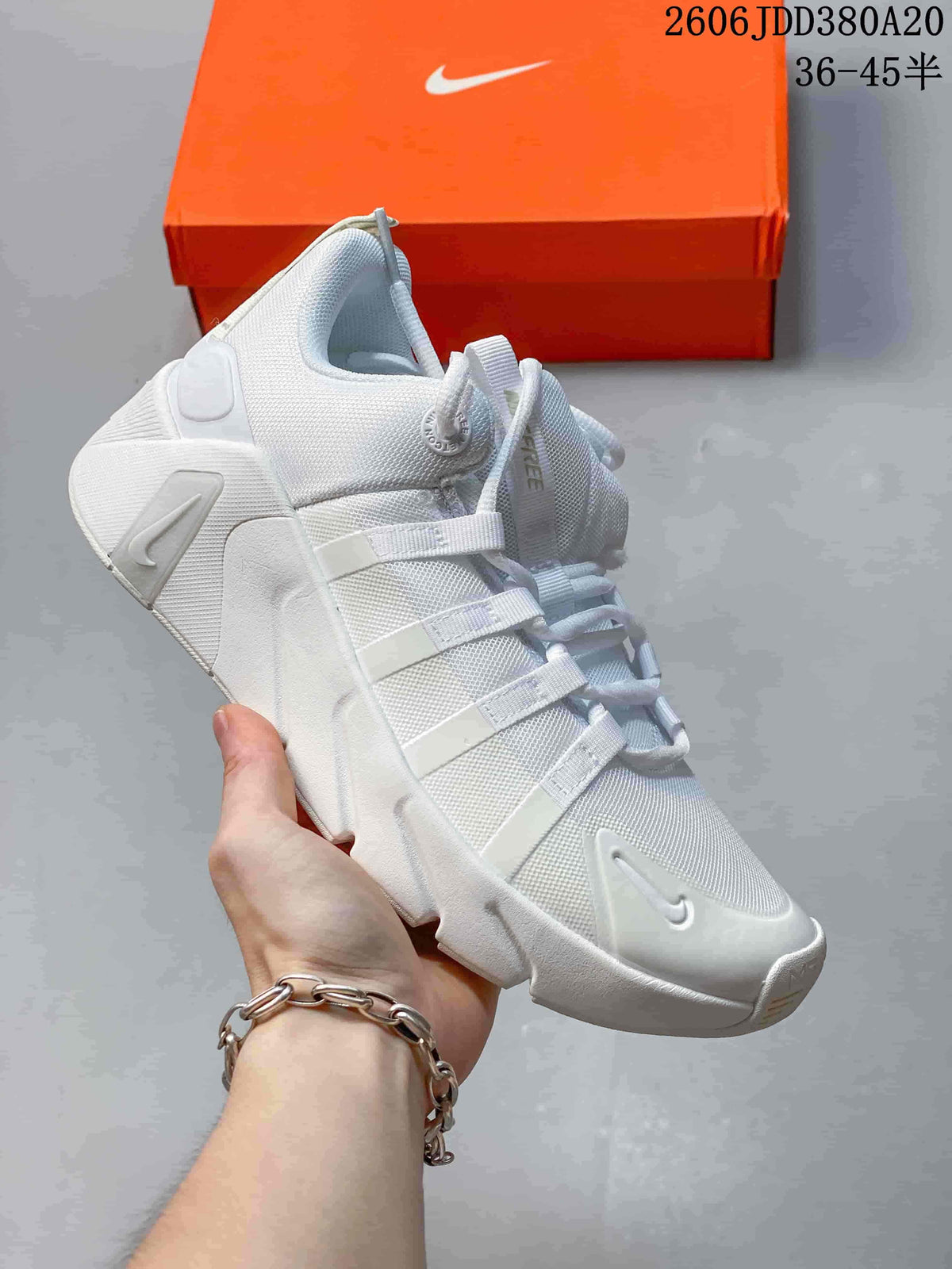 White Nike Free Metcon 7 shoe with a sculpted sole
