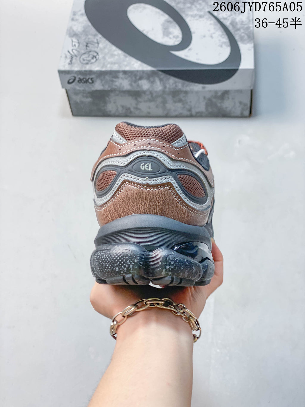 Rear view showing the layered heel and sculpted sole of the sneaker.