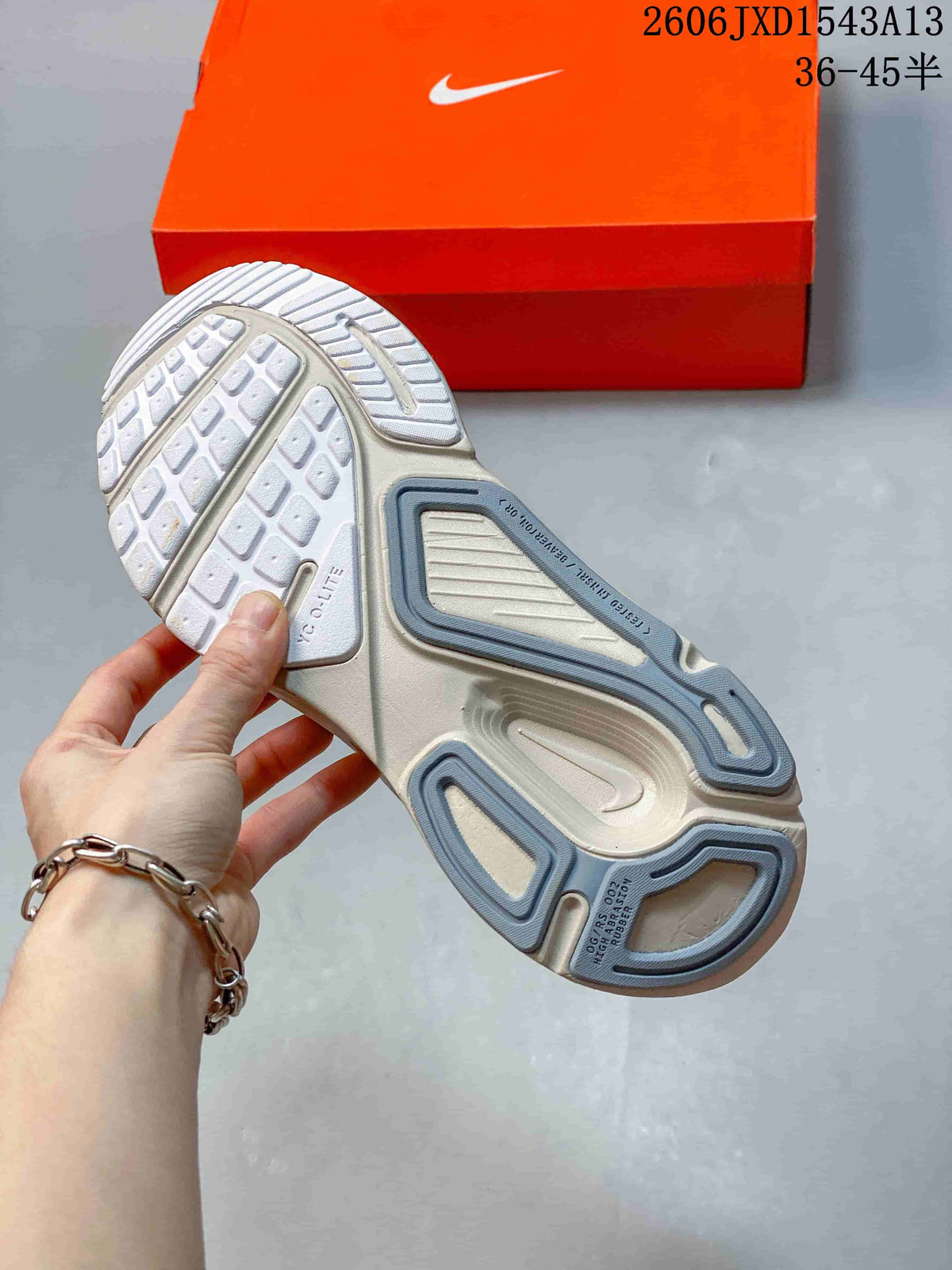 Underside view showing the patterned outsole of a Nike Structure Plus shoe