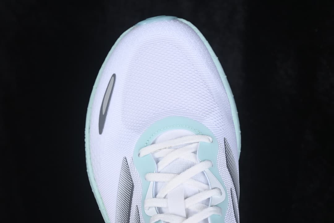 Top view of the white sneaker toe and lace area