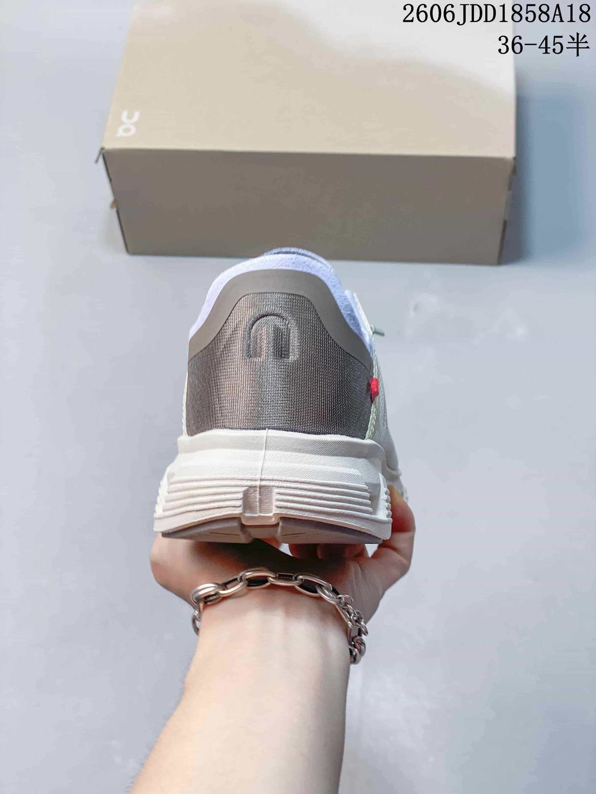 Rear view showing the heel panel and pull tab