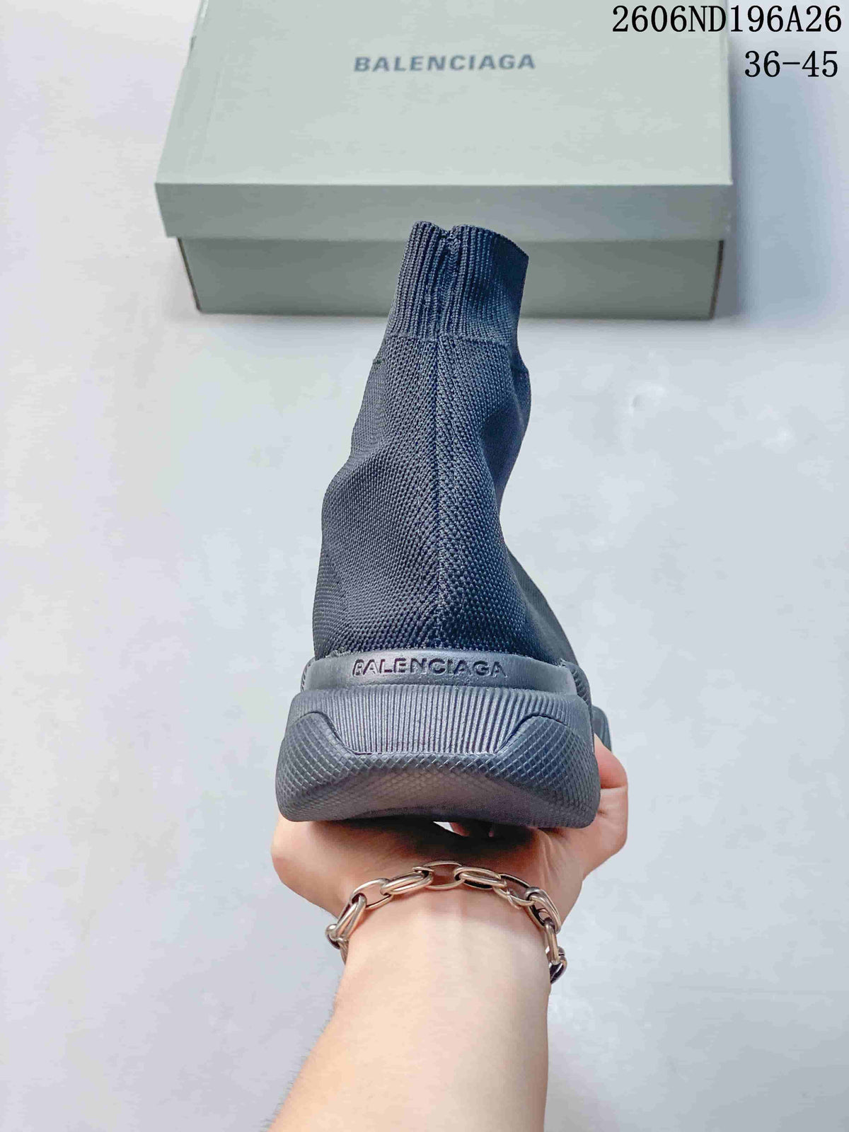 Rear view showing the high knit-look collar and sculpted heel of a charcoal grey sneaker