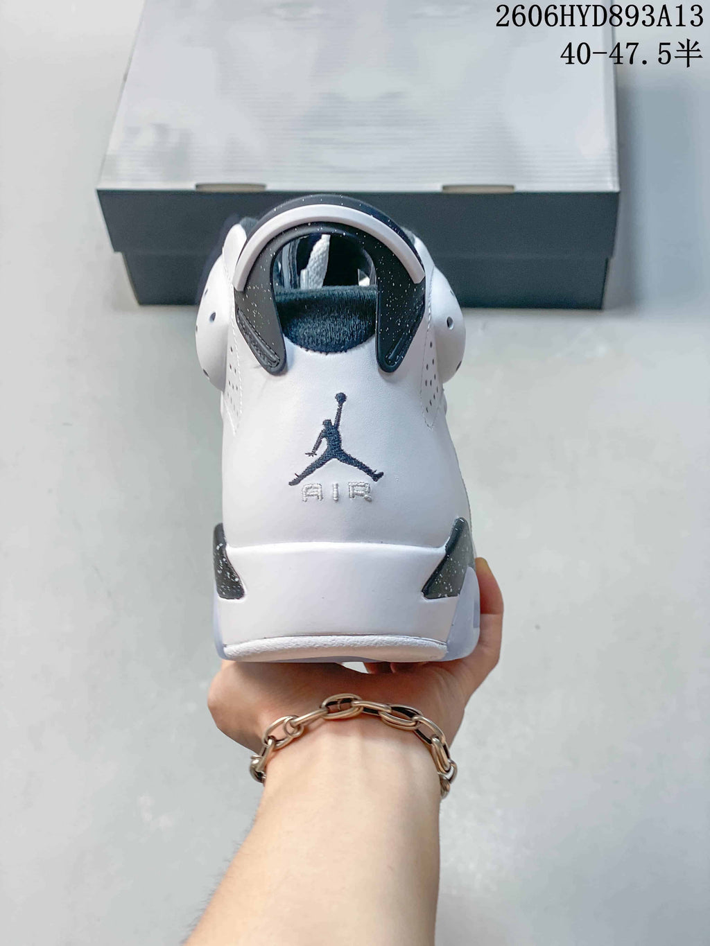 Rear view showing the heel pull tab and embroidered Jumpman and Air details