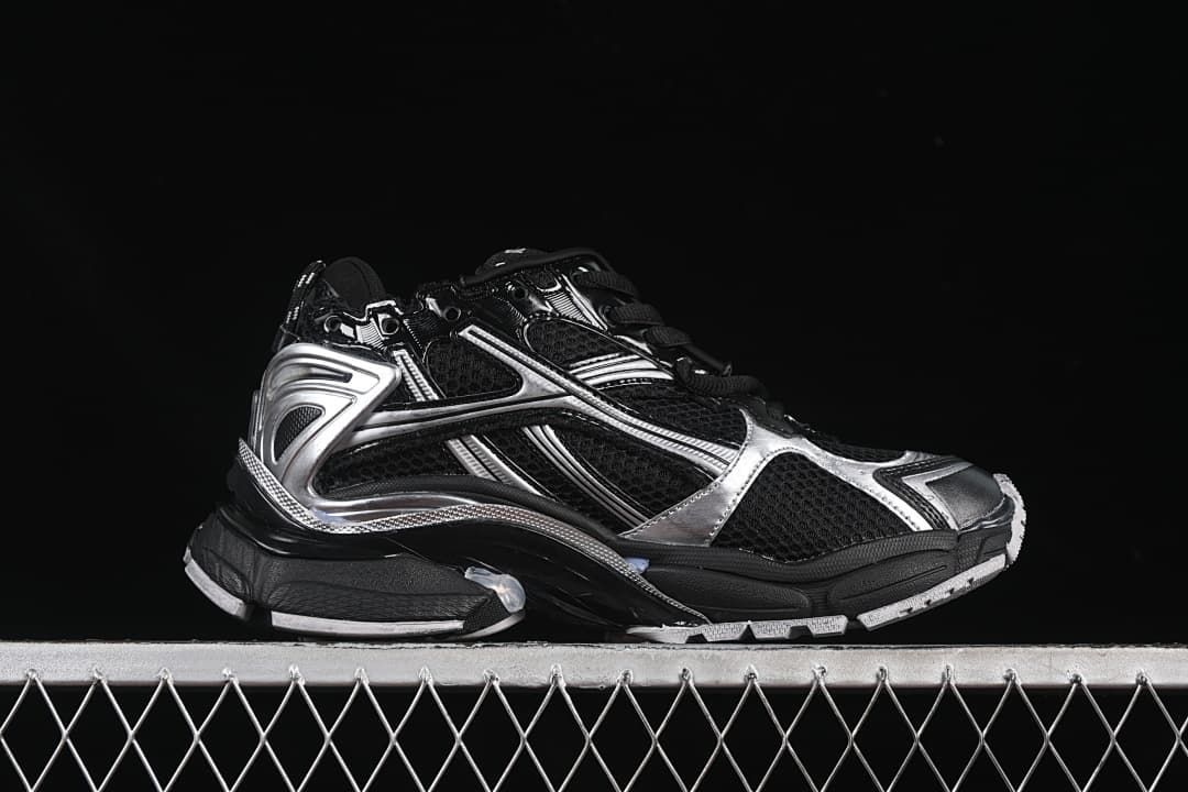 Side profile highlighting the layered black and silver construction.