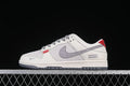 Side view of an off-white and grey Nike SB Dunk Low sneaker with red heel accent and grey swoosh.