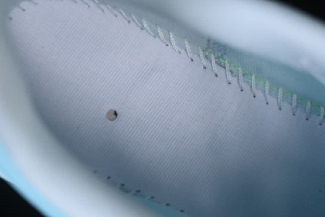 Close-up view inside the shoe showing the lining and stitching.