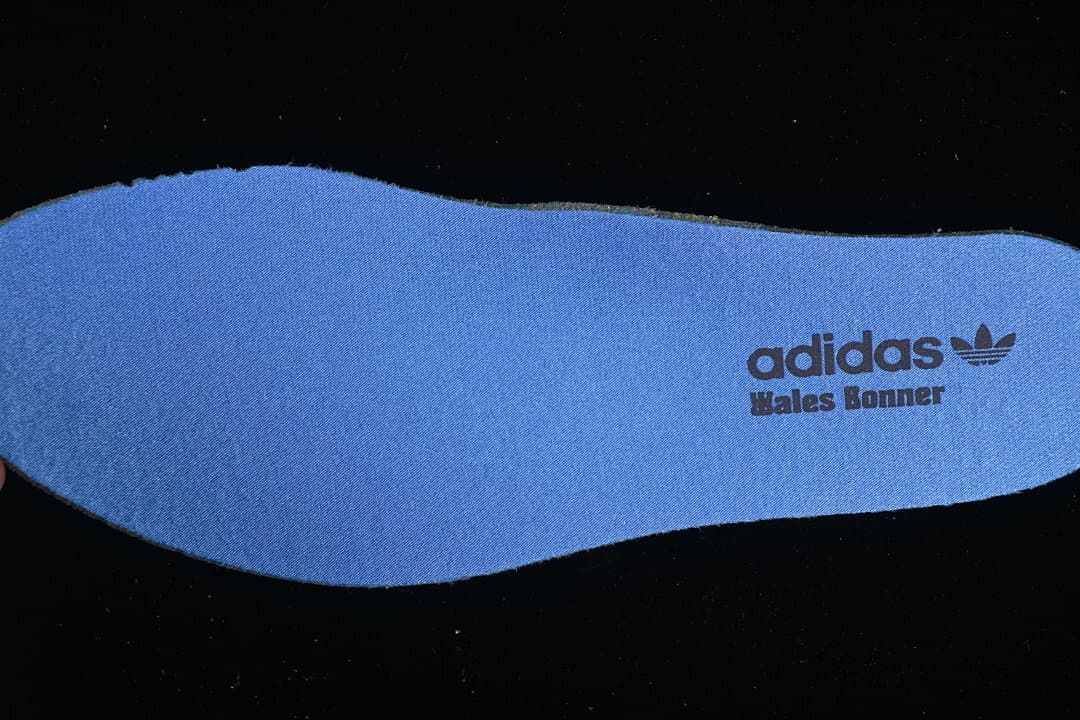 Blue insole with adidas and Wales Bonner branding.