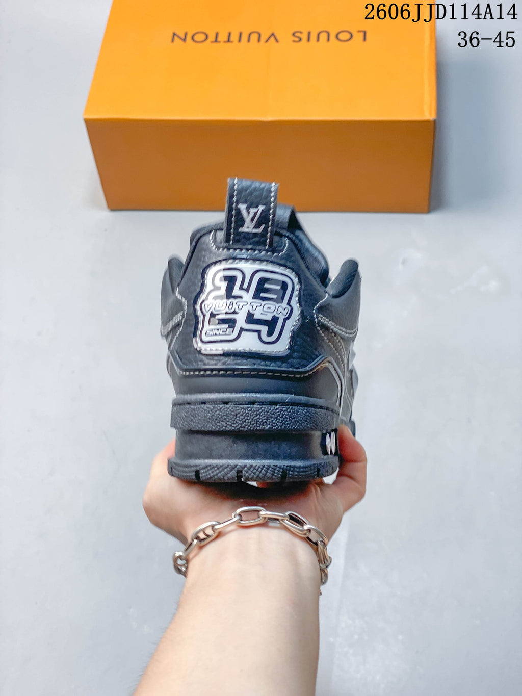 Rear view showing the heel branding and layered outsole