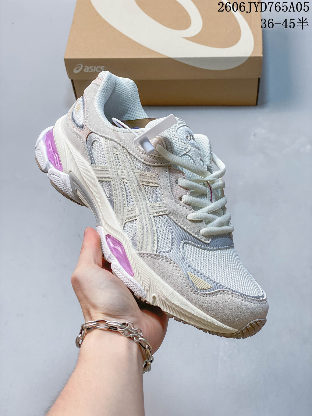 Side view of a light neutral ASICS GEL-SD Lyte UB12-S sneaker