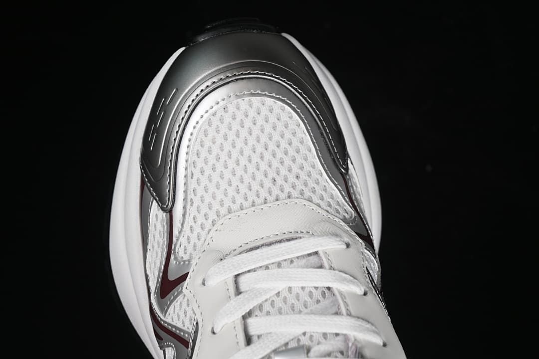 Top-down close-up of the sneaker toe and laces