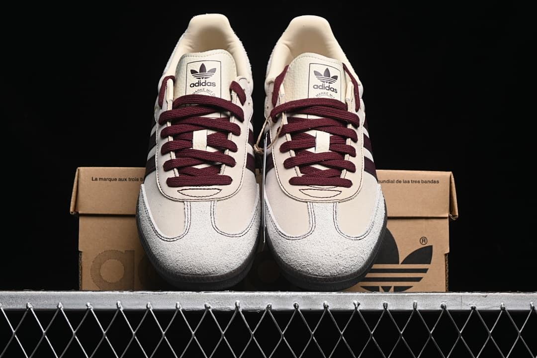 Front view of the pair displayed on a branded box.