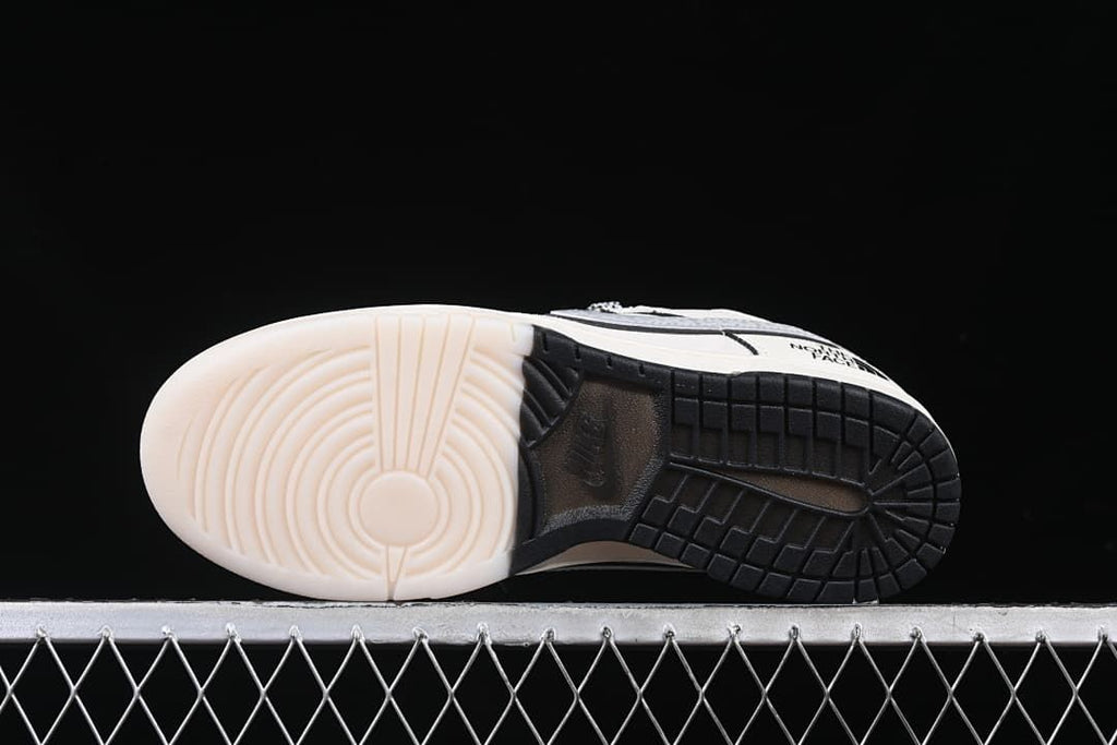Underside view showing a two-tone white and black outsole