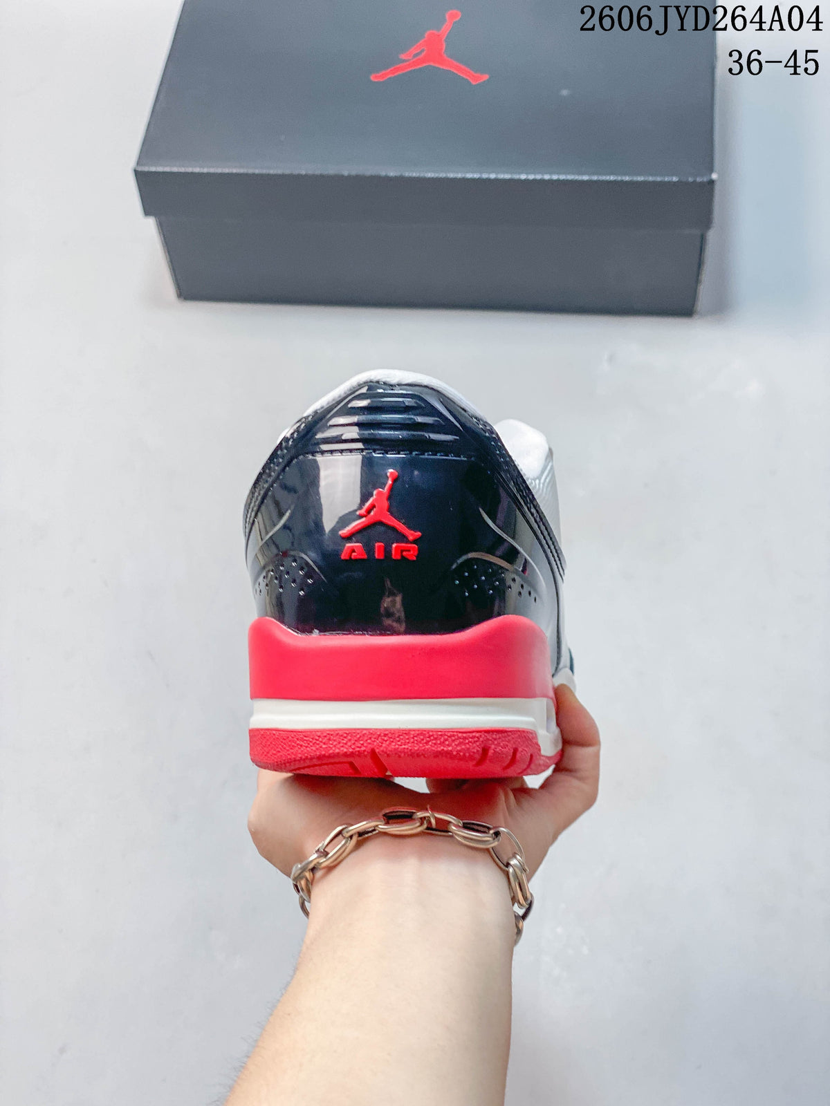 Rear view of the sneaker with navy heel panel and red accents