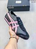 Dark gray low-top sneaker with pink side stripes and black trim