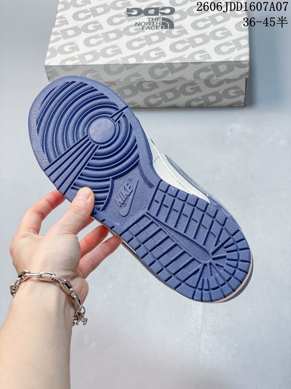Blue outsole of a low-top sneaker