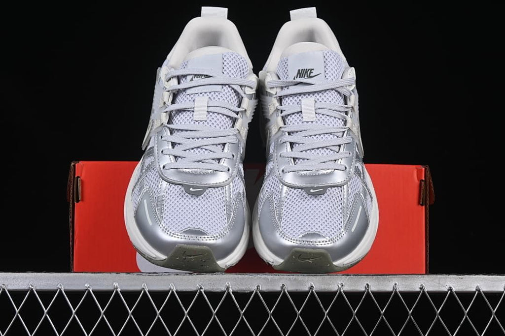 Front view of the pair displayed on a shoe box