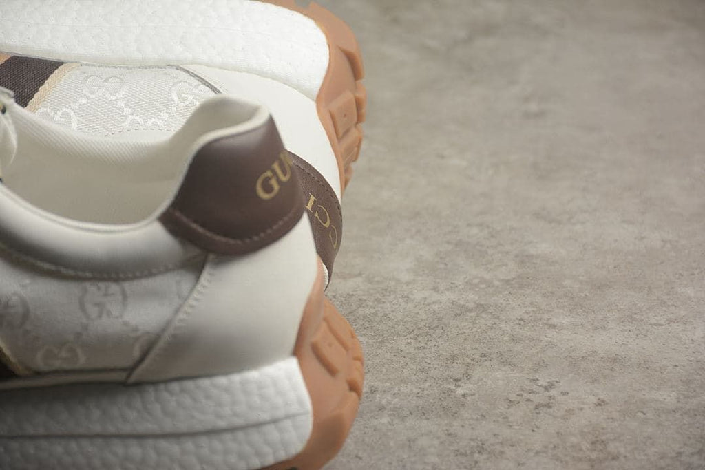 Close-up of the sneaker heel with brown heel detail and patterned upper