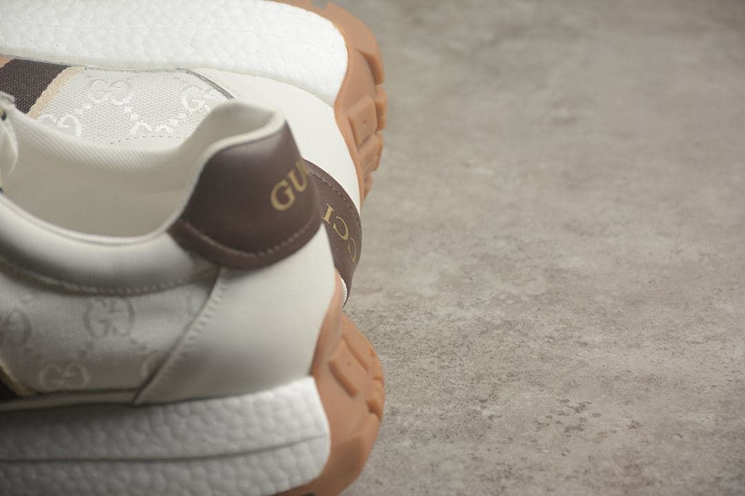Close-up of the sneaker heel with brown heel detail and patterned upper