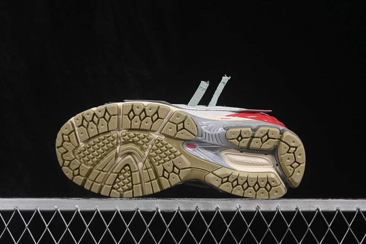 Outsole view showing the segmented tread pattern and central support structure.