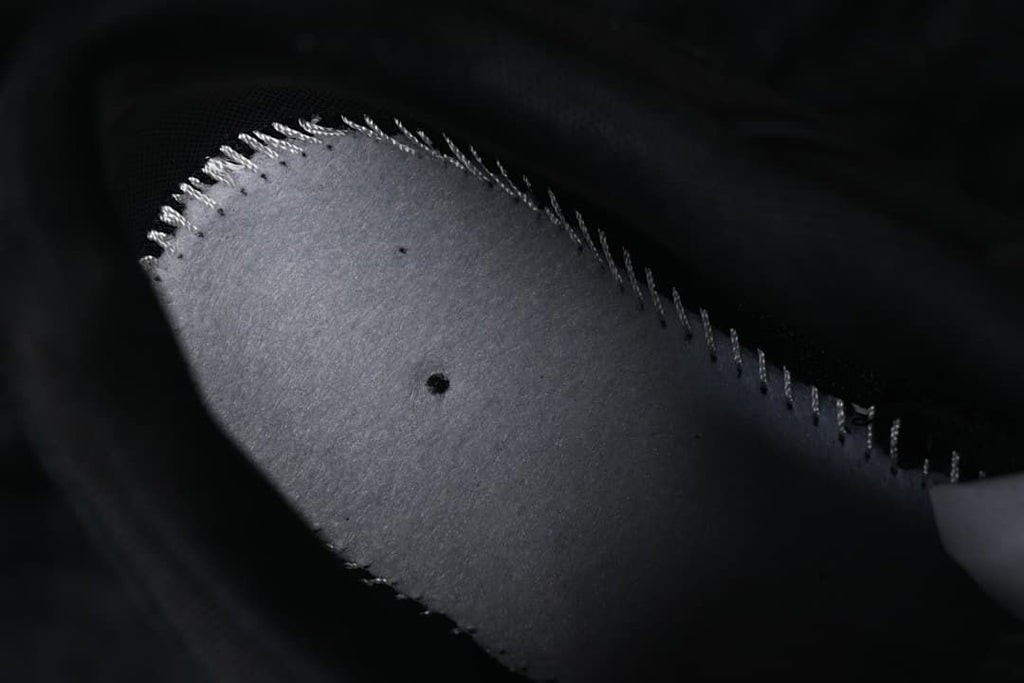 Close-up of the underside of a shoe insole