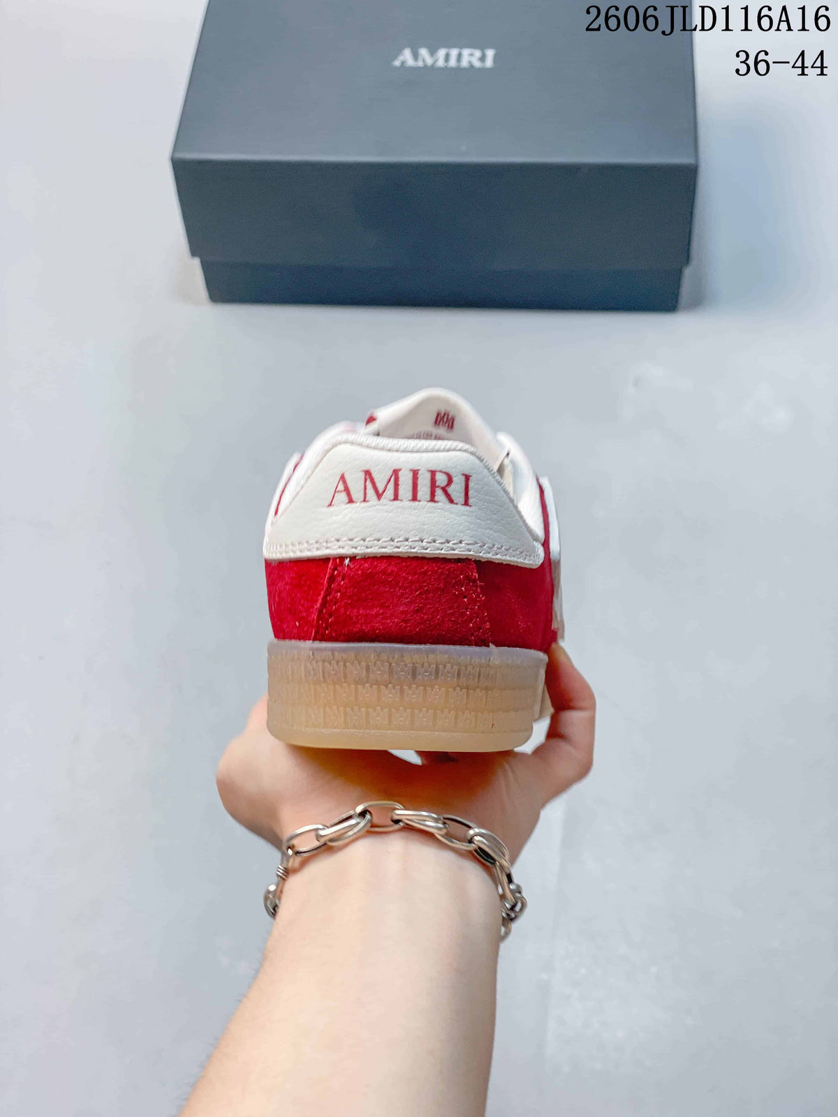 Heel view showing red and white panels and AMIRI lettering