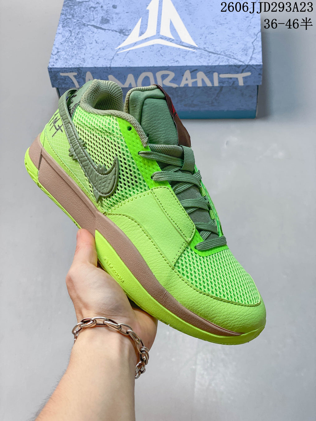 Neon green Nike Ja 1 EP shoe with gray accents.