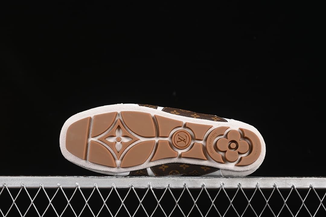 Underside view showing the segmented gum-colored outsole pattern.