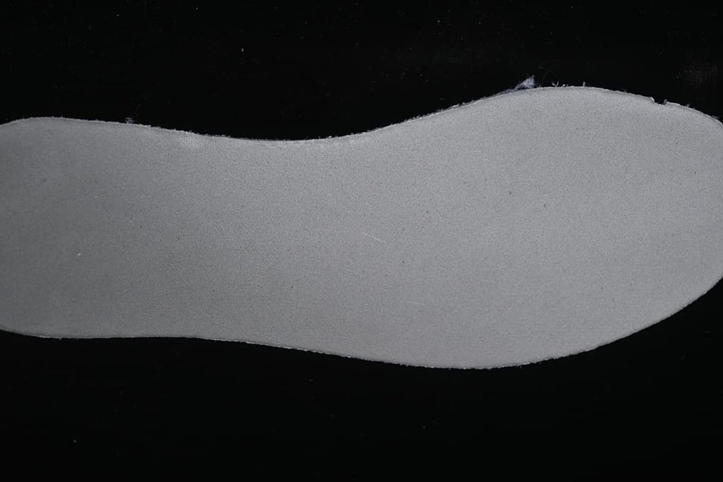 Close-up of the sneaker's removable insole underside