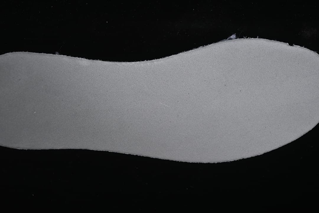 Close-up of the sneaker's removable insole underside