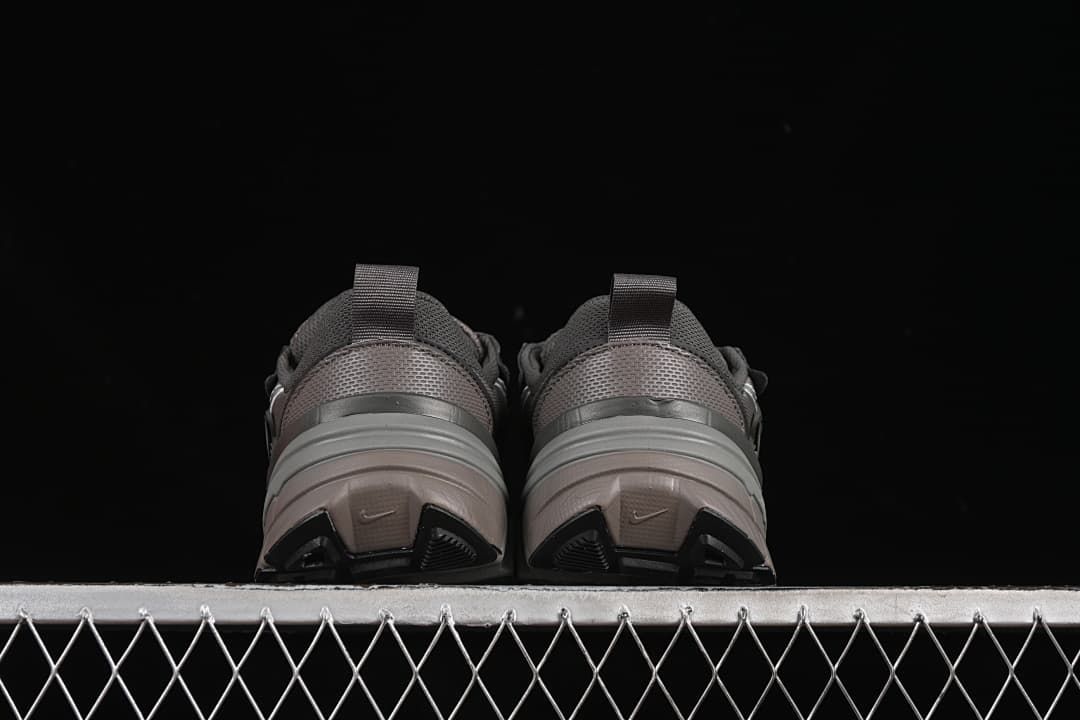 Rear view of the pair showing heel pull tabs and chunky soles
