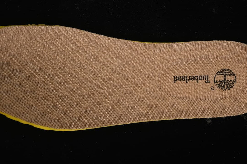View of the boot's tan insole with Timberland branding