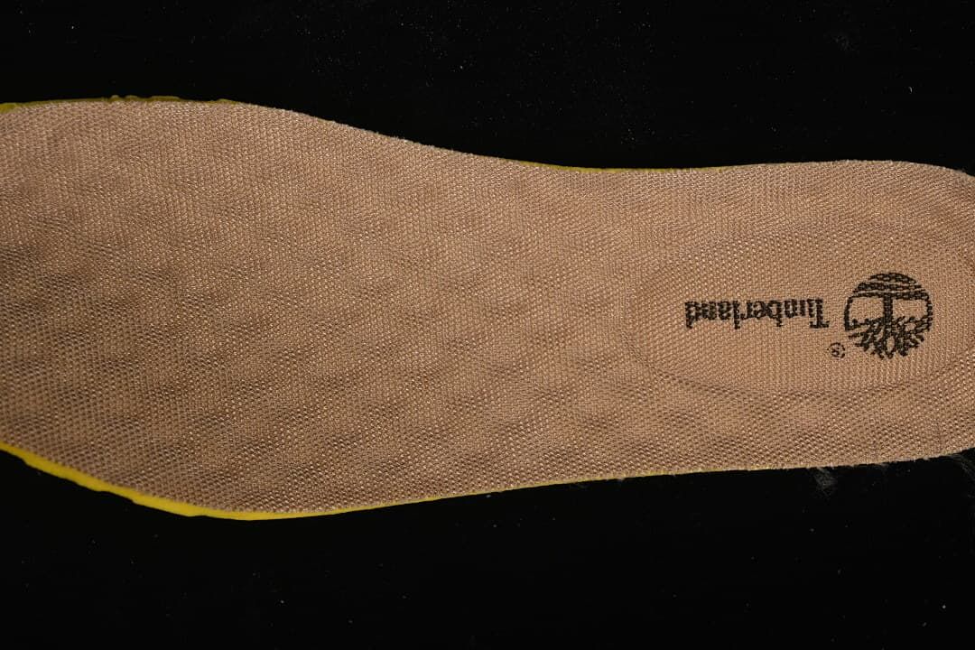 View of the boot's tan insole with Timberland branding