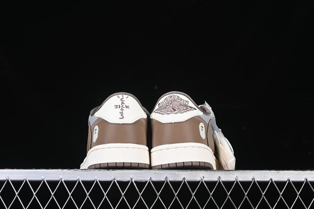 Rear view of both shoes showing contrasting heel embroidery.
