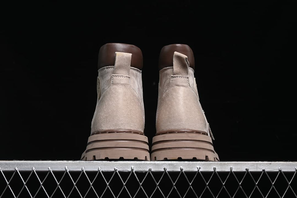 Rear view of the pair showing pull loops and layered soles