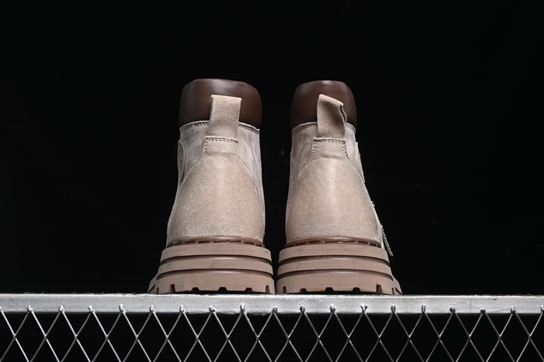 Rear view of the pair showing pull loops and layered soles