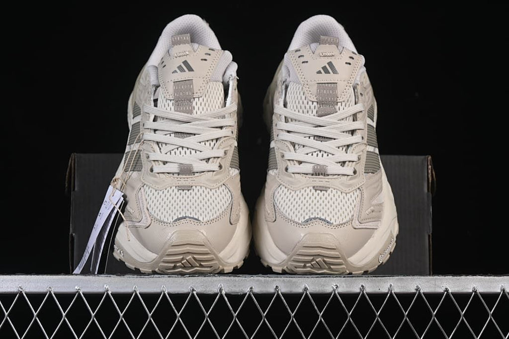 Front view of the pair showing mesh toe panels and laces
