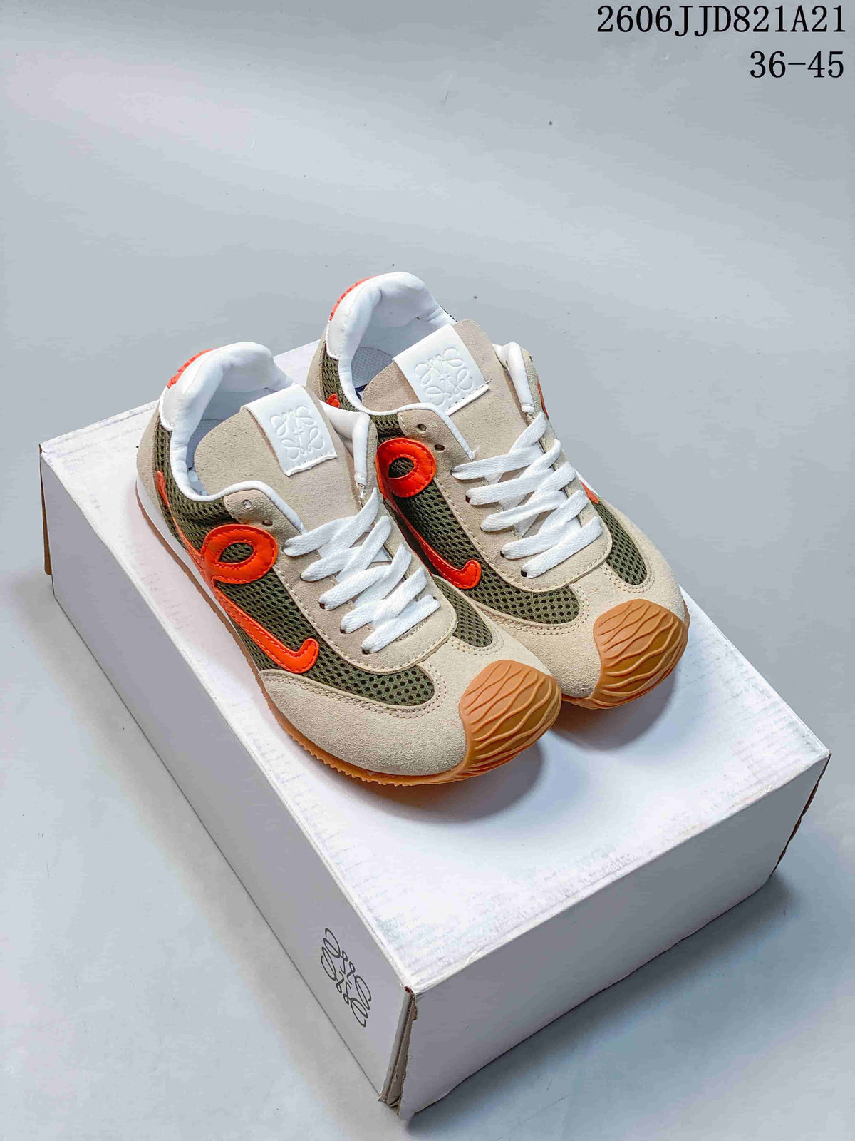 Pair of beige, olive mesh and orange Loewe low-top sneakers on a box