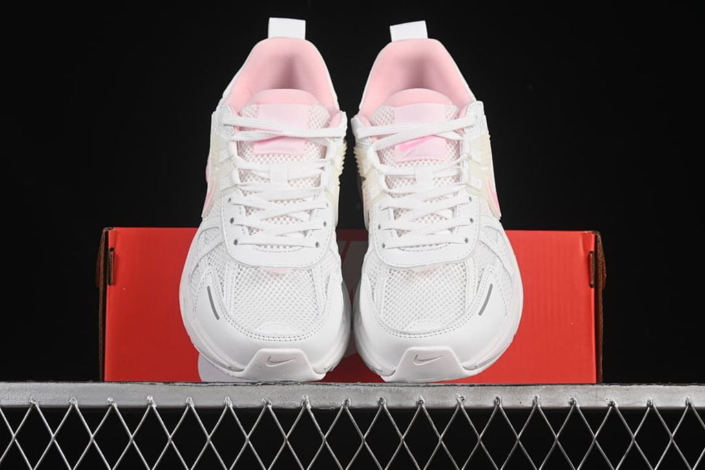 Front view of the pair resting on a red shoebox