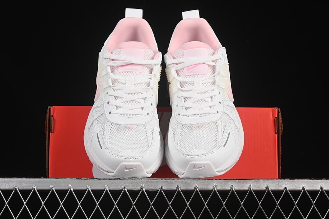 Front view of the pair resting on a red shoebox