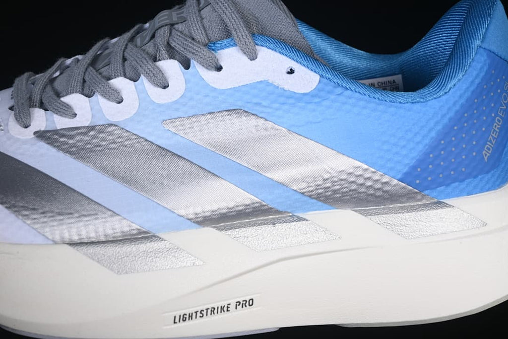 Close-up of the silver side stripes and Lightstrike Pro midsole marking.