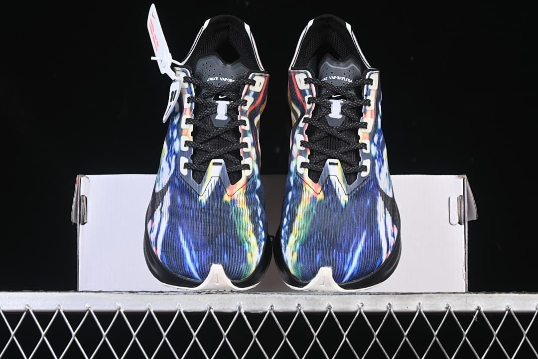 Front view of the pair showing multicolor toe panels and black laces