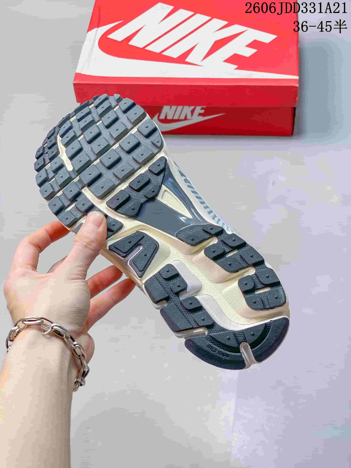Close-up of the Nike Zoom Vomero 5 outsole with segmented dark rubber tread