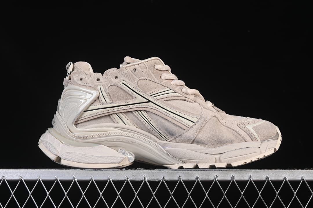 Side profile showing the layered upper and sculpted sole