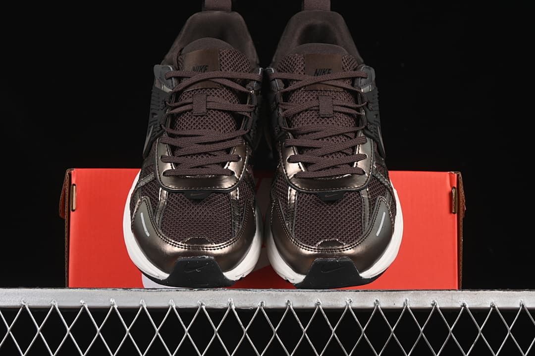 Front view of the pair showing the laces, mesh-look panels, and contrasting soles