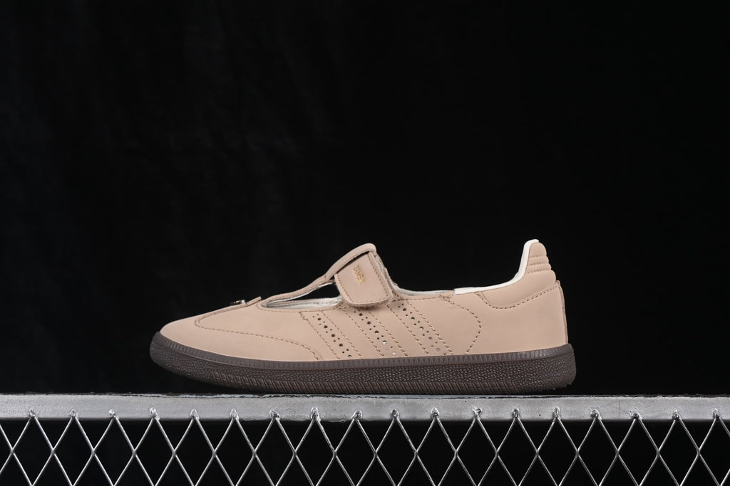 Opposite side profile of the beige Mary Jane-style sneaker showing the strap construction and dark outsole.